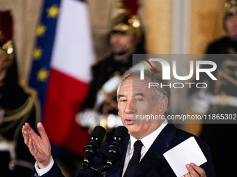 Francois Bayrou speaks during the handover ceremony between Michel Barnier, the outgoing Prime Minister, and Francois Bayrou, the new French...