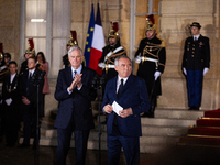 Michel Barnier, the resigning prime minister, and Francois Bayrou, are seen during the speech of the handover ceremony between Michel Barnie...