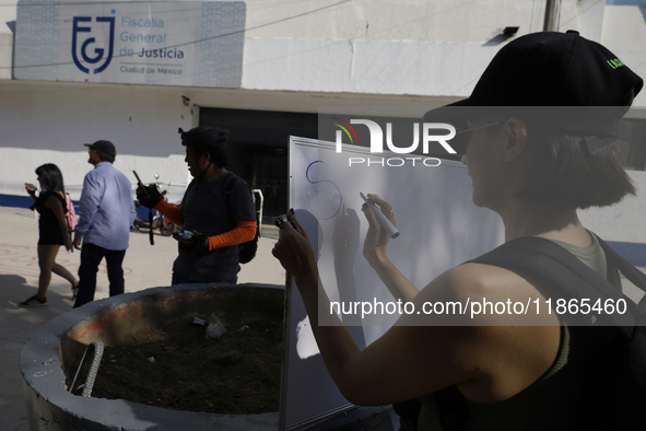 Activists sign documents to receive dogs that are rescued from a shelter in Mexico City, Mexico, on December 13, 2024, after 17 days of unce...