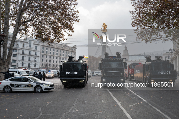 Water cannons and police are back on the streets on the day of the election of the new president, Mikheil Kavelashvili, a pro-Russian former...