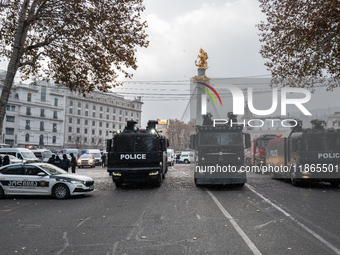 Water cannons and police are back on the streets on the day of the election of the new president, Mikheil Kavelashvili, a pro-Russian former...