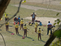 Indian school children practice their school drill at a ground in Siliguri, India, on December 14, 2024. (