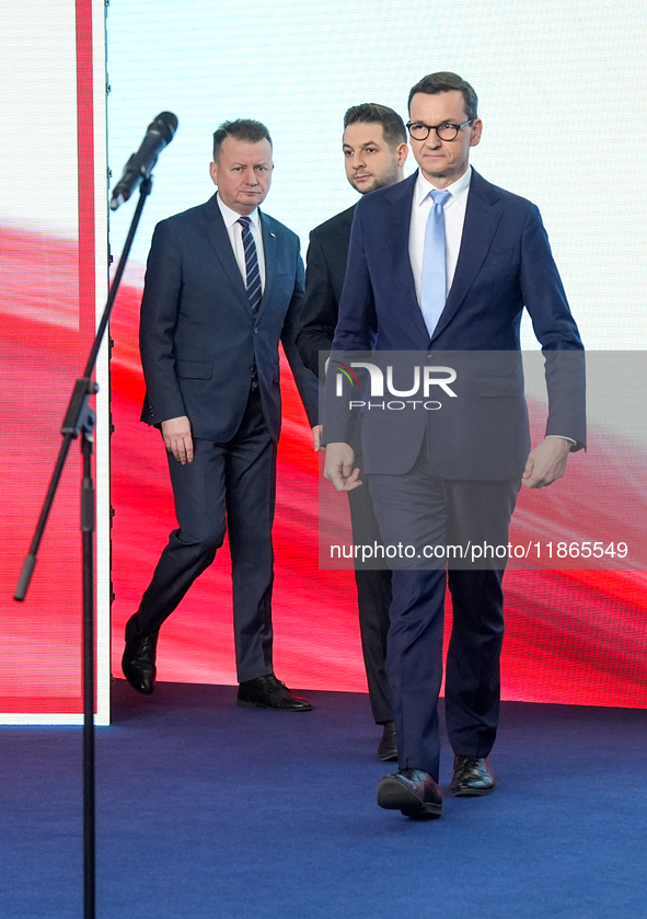 Mariusz Blaszczak,atryk Jaki (MEP), Mateusz Morawiecki   during press conference of the right-wing Law and Justice (PiS) party, in Warsaw, P...