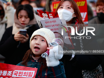 Approximately 2 million citizens gather in Yeouido, Seoul, South Korea, on December 14, 2024, calling for the impeachment of President Yoon...