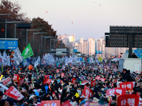 Citizens cheer after the impeachment of President Yoon Suk-yeol is passed in Seoul, South Korea, on December 14, 2024. Approximately 2 milli...