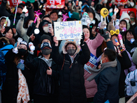 Citizens cheer after the impeachment of President Yoon Suk-yeol is passed in Seoul, South Korea, on December 14, 2024. Approximately 2 milli...