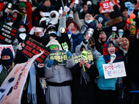 Citizens cheer after the impeachment of President Yoon Suk-yeol is passed in Seoul, South Korea, on December 14, 2024. Approximately 2 milli...