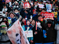 Citizens cheer after the impeachment of President Yoon Suk-yeol is passed in Seoul, South Korea, on December 14, 2024. Approximately 2 milli...