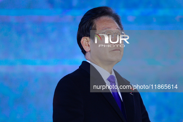 Lee Jae-myung, leader of the Democratic Party and member of the National Assembly, greets approximately 2 million citizens gathered outside...