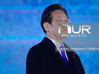 Lee Jae-myung, leader of the Democratic Party and member of the National Assembly, greets approximately 2 million citizens gathered outside...