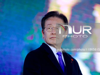 Lee Jae-myung, leader of the Democratic Party and member of the National Assembly, greets approximately 2 million citizens gathered outside...