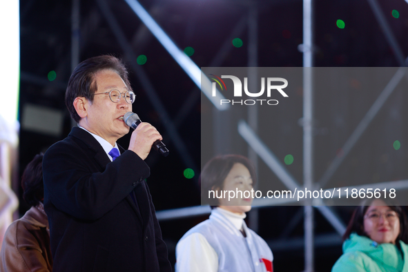 Lee Jae-myung, leader of the Democratic Party and member of the National Assembly, greets approximately 2 million citizens gathered outside...