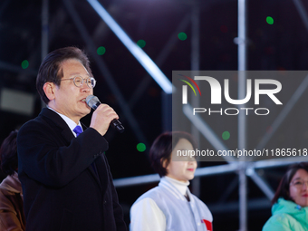 Lee Jae-myung, leader of the Democratic Party and member of the National Assembly, greets approximately 2 million citizens gathered outside...