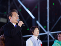 Lee Jae-myung, leader of the Democratic Party and member of the National Assembly, greets approximately 2 million citizens gathered outside...