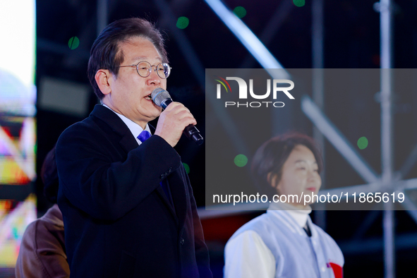 Lee Jae-myung, leader of the Democratic Party and member of the National Assembly, greets approximately 2 million citizens gathered outside...