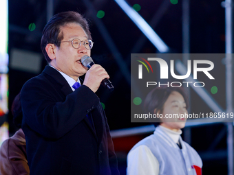 Lee Jae-myung, leader of the Democratic Party and member of the National Assembly, greets approximately 2 million citizens gathered outside...