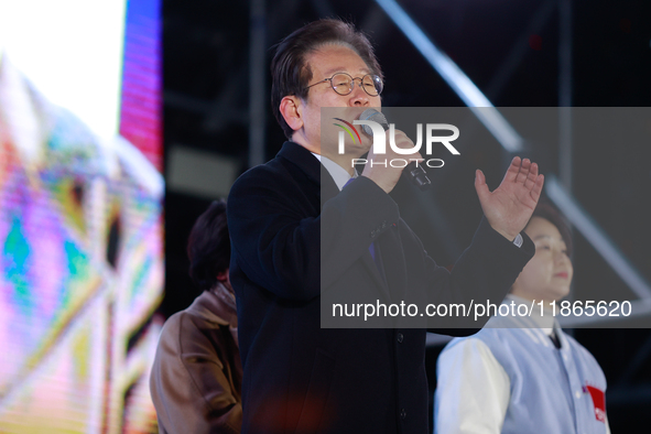 Lee Jae-myung, leader of the Democratic Party and member of the National Assembly, greets approximately 2 million citizens gathered outside...