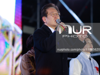 Lee Jae-myung, leader of the Democratic Party and member of the National Assembly, greets approximately 2 million citizens gathered outside...