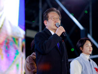 Lee Jae-myung, leader of the Democratic Party and member of the National Assembly, greets approximately 2 million citizens gathered outside...