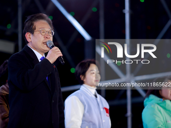 Lee Jae-myung, leader of the Democratic Party and member of the National Assembly, greets approximately 2 million citizens gathered outside...