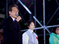 Lee Jae-myung, leader of the Democratic Party and member of the National Assembly, greets approximately 2 million citizens gathered outside...