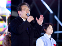 Lee Jae-myung, leader of the Democratic Party and member of the National Assembly, greets approximately 2 million citizens gathered outside...