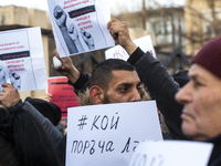 Representatives of the parliamentary party We Continue the Change stand in front of the Sofia City Court in Sofia, Bulgaria, on December 14,...