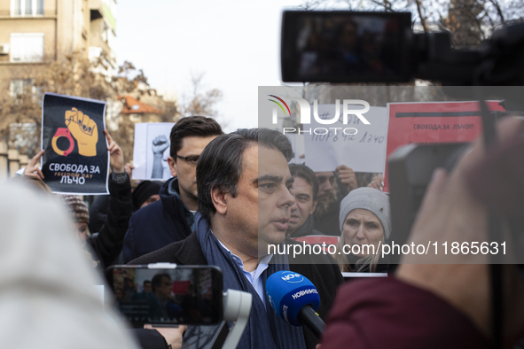 Asen Vasilev, co-leader of the political party We Continue the Change, stands in front of the Sofia City Court in Sofia, Bulgaria, on Decemb...