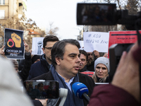 Asen Vasilev, co-leader of the political party We Continue the Change, stands in front of the Sofia City Court in Sofia, Bulgaria, on Decemb...