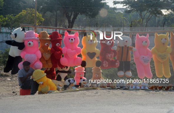 A roadside seller sells soft toys in Siliguri, India, on December 14, 2024. 