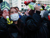 Citizens cheer after the impeachment of President Yoon Suk-yeol is passed in Seoul, South Korea, on December 14, 2024. Approximately 2 milli...