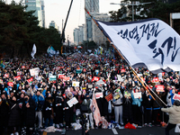 Citizens cheer after the impeachment of President Yoon Suk-yeol is passed in Seoul, South Korea, on December 14, 2024. Approximately 2 milli...