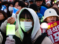 Citizens cheer after the impeachment of President Yoon Suk-yeol is passed in Seoul, South Korea, on December 14, 2024. Approximately 2 milli...