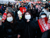 Citizens cheer after the impeachment of President Yoon Suk-yeol is passed in Seoul, South Korea, on December 14, 2024. Approximately 2 milli...