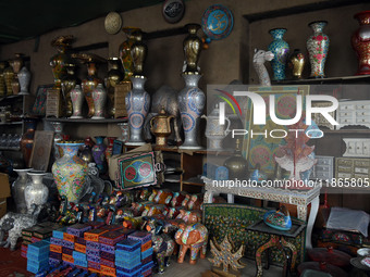 In Srinagar, Kashmir, India, on December 14, 2024, Christmas ornaments are ready at the workshop before being sent to the market ahead of Ch...