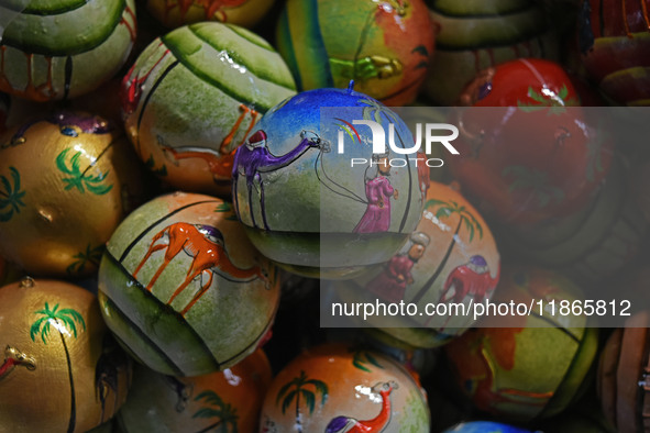 In Srinagar, Kashmir, India, on December 14, 2024, Christmas baubles are ready at the workshop before being sent to the market ahead of Chri...