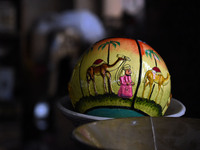 A Christmas bauble is seen at the workshop before being sent to the market ahead of Christmas celebrations in Srinagar, Kashmir, on December...