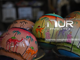 In Srinagar, Kashmir, India, on December 14, 2024, Christmas baubles are ready at the workshop before being sent to the market ahead of Chri...