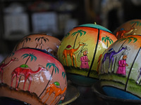 In Srinagar, Kashmir, India, on December 14, 2024, Christmas baubles are ready at the workshop before being sent to the market ahead of Chri...