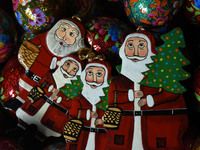 In Srinagar, Kashmir, India, on December 14, 2024, Christmas ornaments of Santa Claus are ready at the workshop before being sent to the mar...