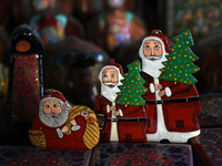 In Srinagar, Kashmir, India, on December 14, 2024, Christmas ornaments of Santa Claus are ready at the workshop before being sent to the mar...