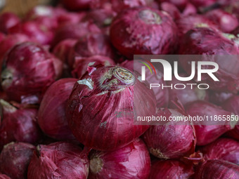 Onions are kept for sale at a market in Srinagar, Jammu and Kashmir, on December 14, 2024. (