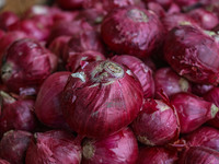 Onions are kept for sale at a market in Srinagar, Jammu and Kashmir, on December 14, 2024. (