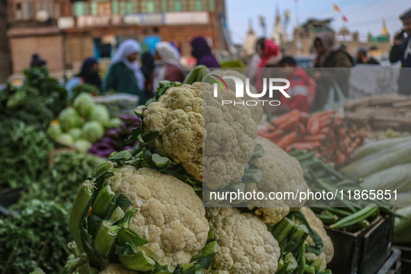 Cauliflowers are kept for sale at a market in Srinagar, Jammu and Kashmir, on December 14, 2024. 