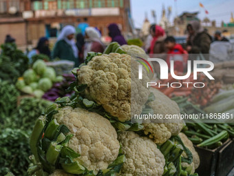 Cauliflowers are kept for sale at a market in Srinagar, Jammu and Kashmir, on December 14, 2024. (