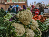 Cauliflowers are kept for sale at a market in Srinagar, Jammu and Kashmir, on December 14, 2024. (