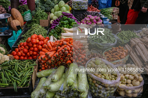 Different kinds of vegetables are kept for sale at a market in Srinagar, Jammu and Kashmir, on December 14, 2024. 