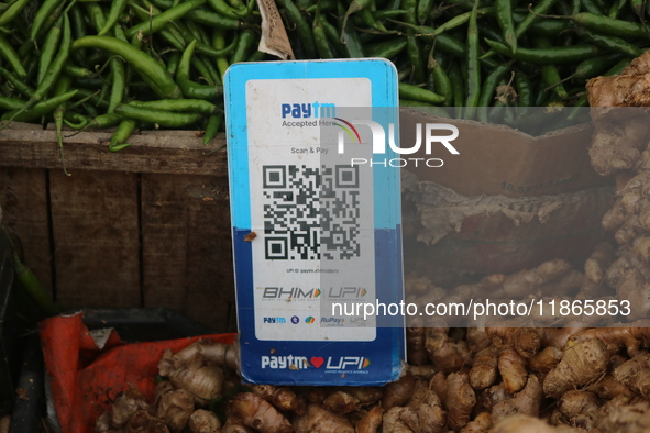 A QR code for the Paytm digital payment system is seen at a market in Srinagar, Jammu and Kashmir, on December 14, 2024. 