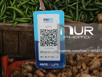 A QR code for the Paytm digital payment system is seen at a market in Srinagar, Jammu and Kashmir, on December 14, 2024. (