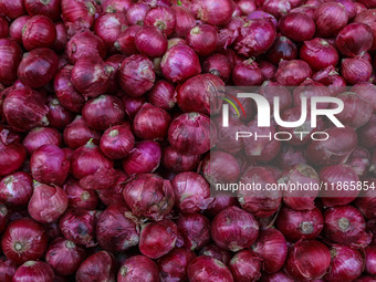 Onions are kept for sale at a market in Srinagar, Jammu and Kashmir, on December 14, 2024. (